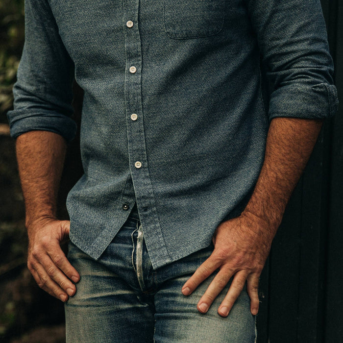 fit model wearing The California in Washed Indigo Crepe, cropped shot chest down with hands in pockets