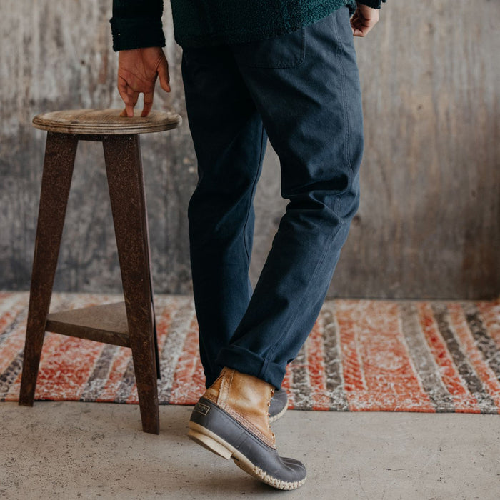 fit model wearing The Camp Pant in Coal Boss Duck, back shot