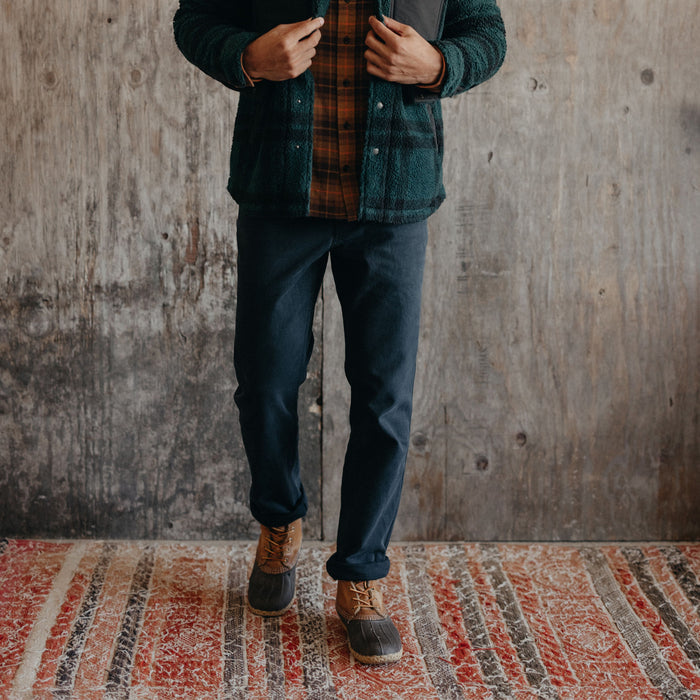 fit model standing in The Camp Pant in Coal Boss Duck
