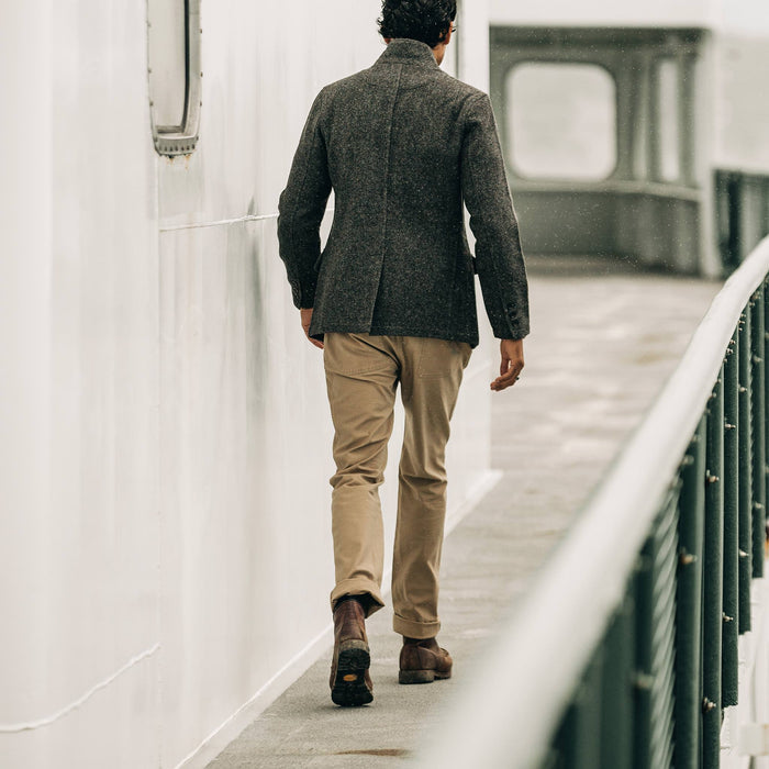 our fit model wearing The Camp Pant in Khaki Reverse Sateen—walking away from camera