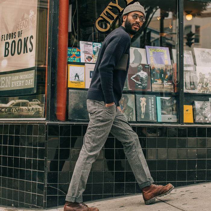 fit model wearing The Camp Pant in Navy Jaspe, walking right