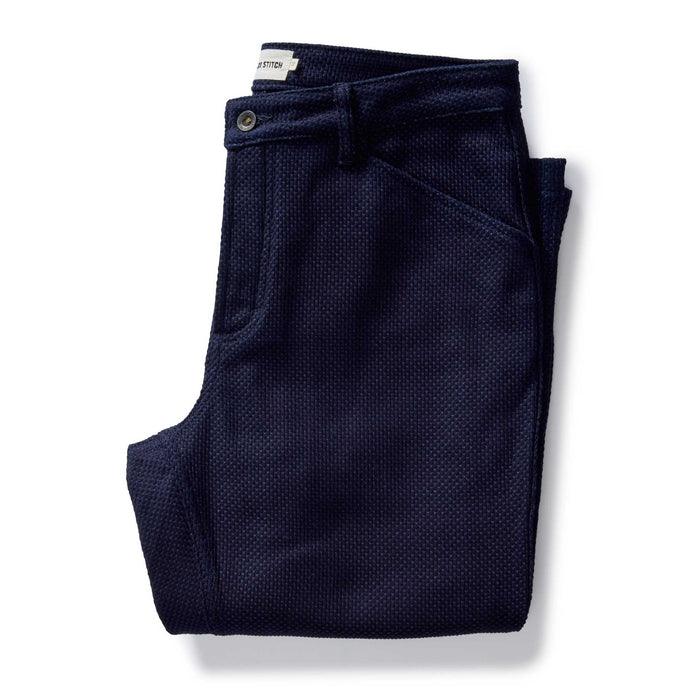 folded flatlay of The Camp Pant in Rigid Indigo Sashiko