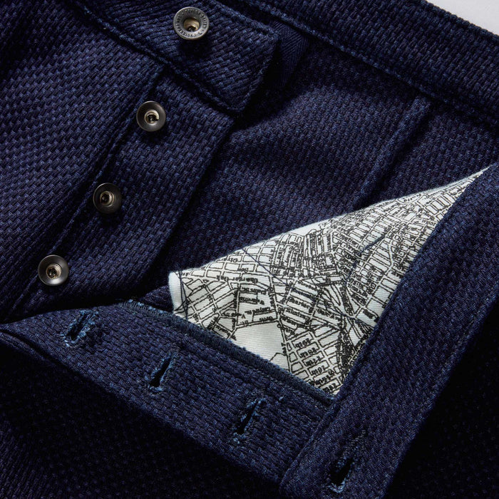 material shot of the button fly on The Camp Pant in Rigid Indigo Sashiko