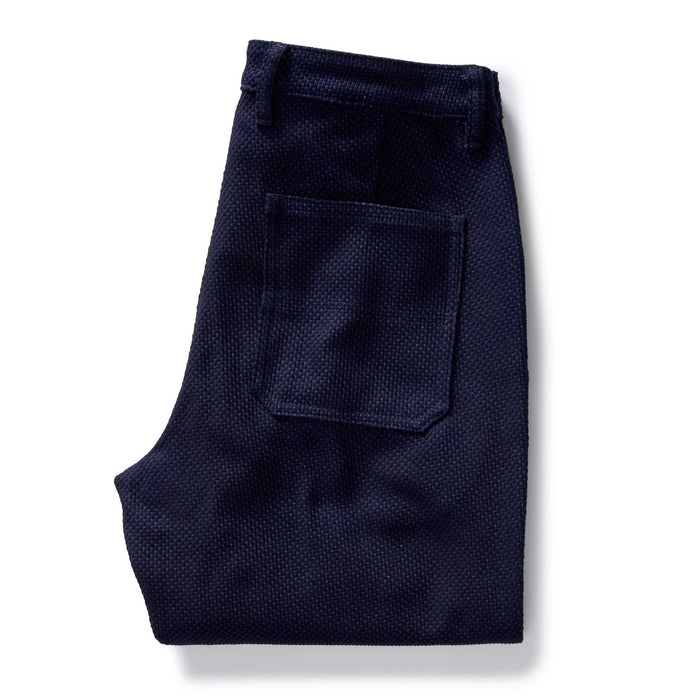 folded flatlay of the back of The Camp Pant in Rigid Indigo Sashiko