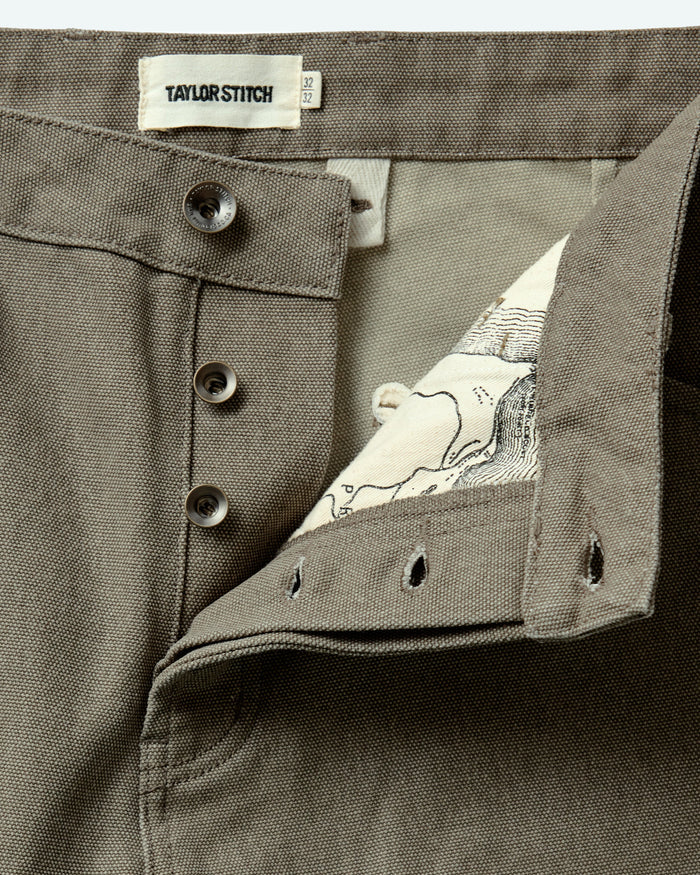fit model showing off the cuffs on The Camp Pant in Stone Chipped Canvas
