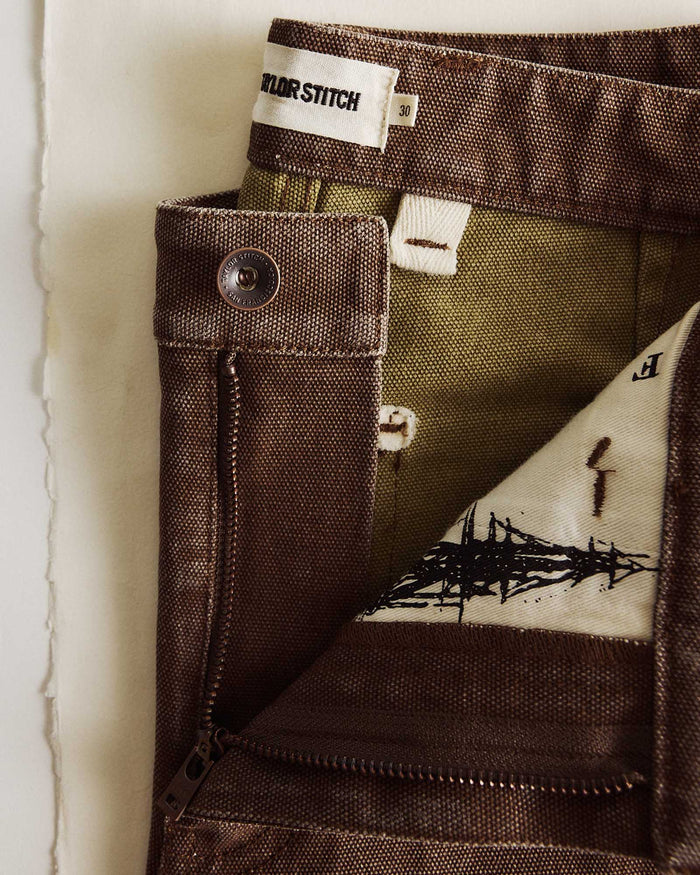 material shot of the button on The Camp Short in Aged Penny Chipped Canvas