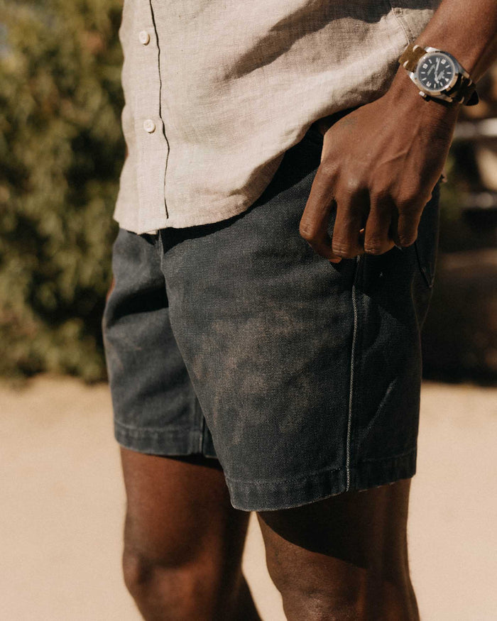 fit model showing off the sides of The Camp Short in Navy Chipped Canvas