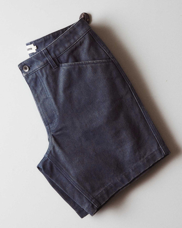 editorial flatlay of The Camp Short in Navy Chipped Canvas folded