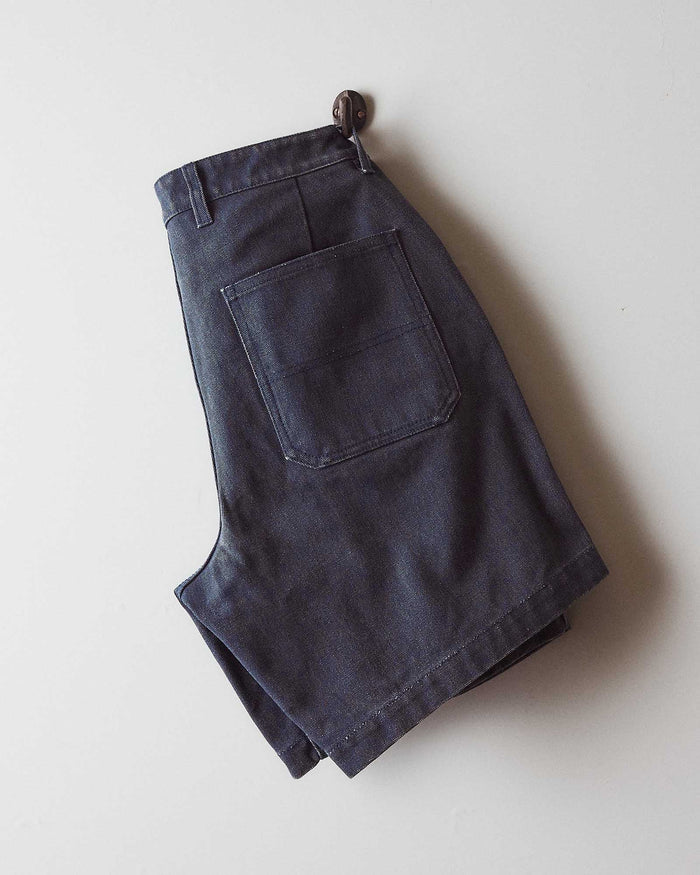 editorial flatlay of the back of The Camp Short in Navy Chipped Canvas