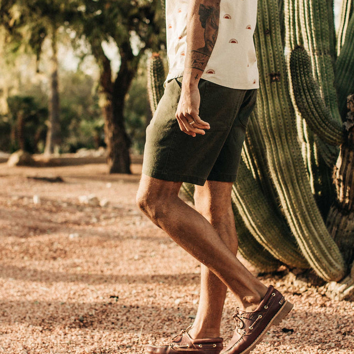 our fit model wearing The Camp Short in Olive Boss Duck