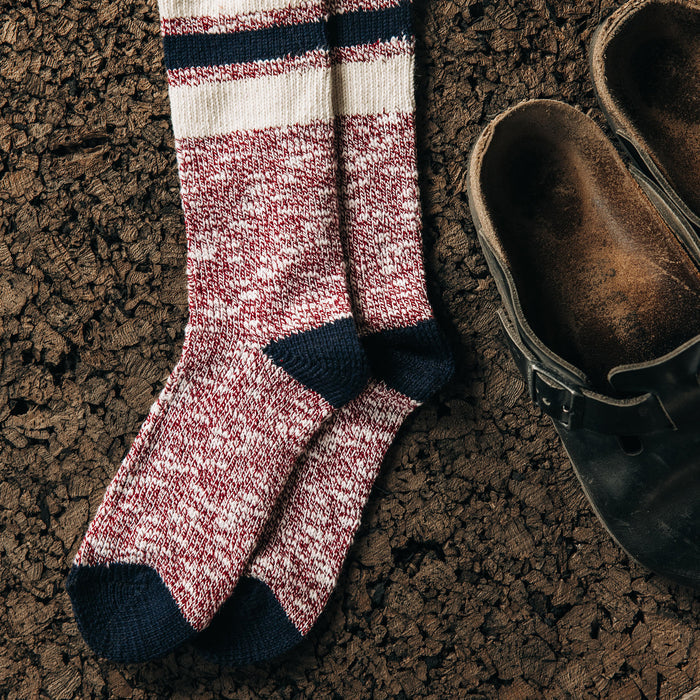 editorial image of The Camp Sock in Heather Burgundy on the ground