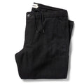 flatlay of The Carmel Pant in Dark Charcoal folded