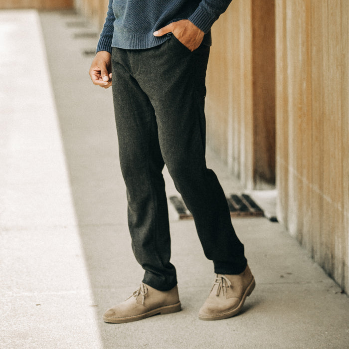 fit model with his hand in the pocket of The Carmel Pant in Dark Charcoal