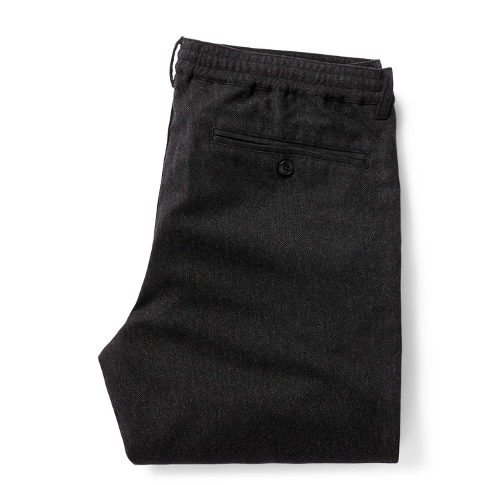 flatlay of the back of The Carmel Pant in Dark Charcoal folded
