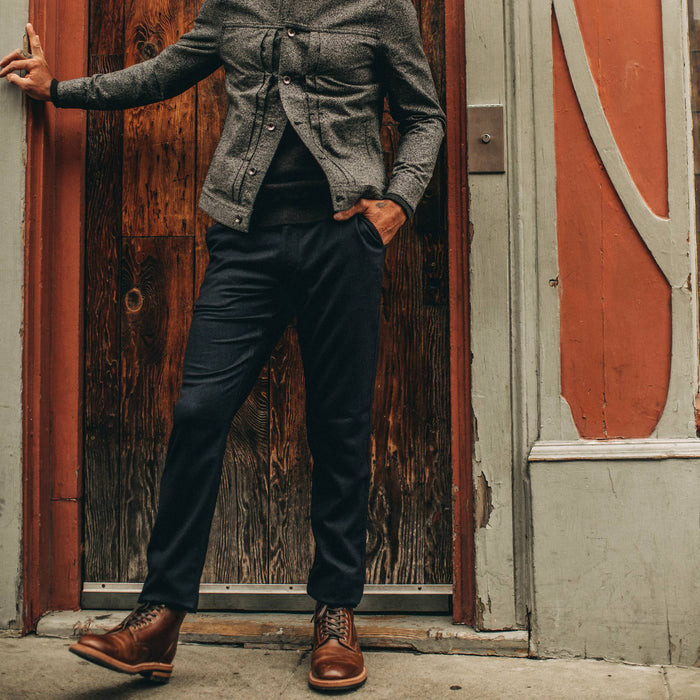 fit model wearing The Carmel Pant in Navy Wool, hand in pocket