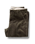 folded flatlay of The Carnegie Pant in Fatigue Olive Corduroy