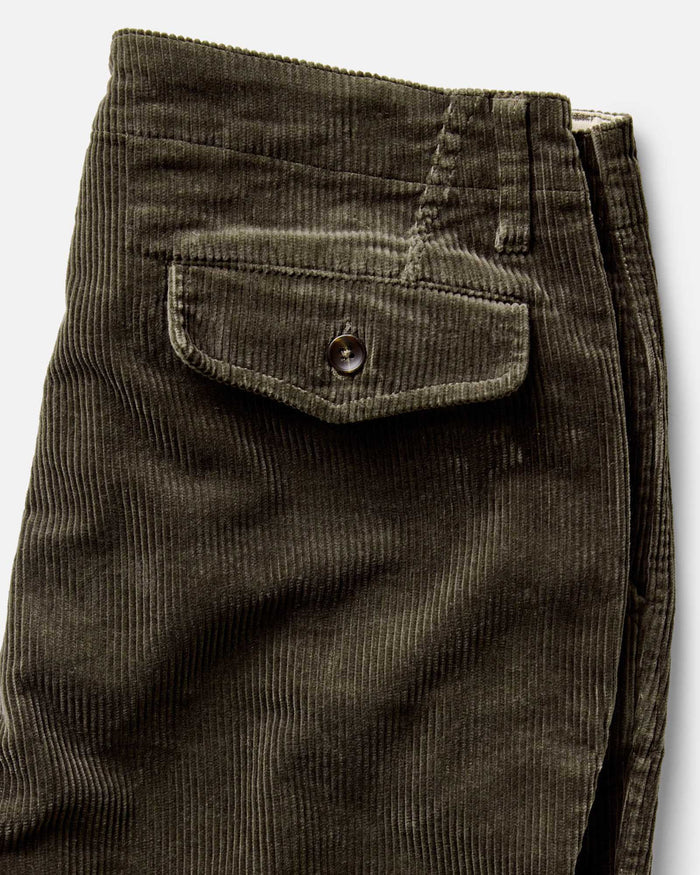 material shot of the back pocket on The Carnegie Pant in Fatigue Olive Corduroy