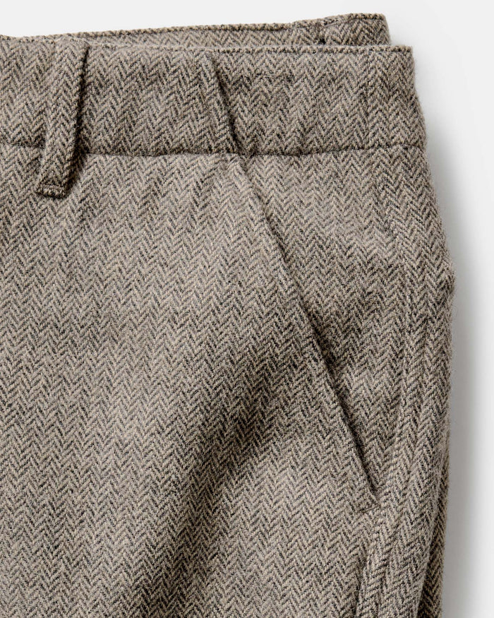 material shot of the pocket on The Carnegie Pant in Gravel Herringbone Wool