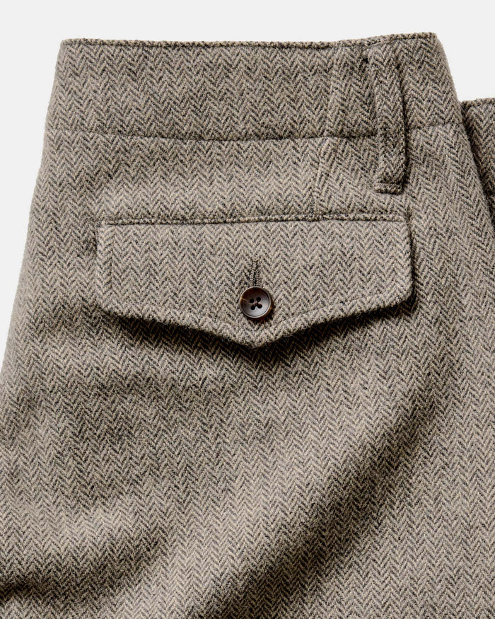 material shot of the back pocket on The Carnegie Pant in Gravel Herringbone Wool