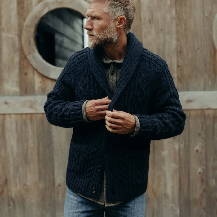 fit model buttoning up The Cascade Shawl Cardigan in Heather Marine