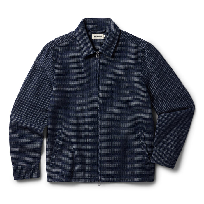 flatlay of The Cavern Jacket in Navy Dobby Grid