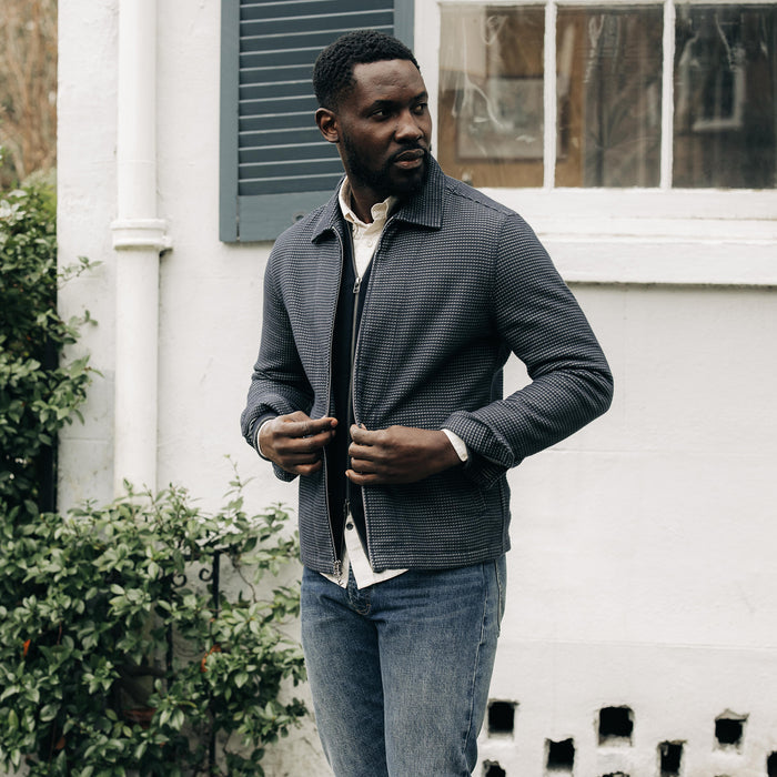 fit model wearing The Cavern Jacket in Navy Dobby Grid