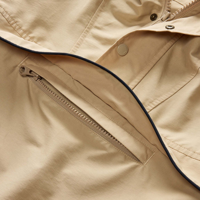material shot of the hidden pocket on The Chapman Anorak in Light Khaki