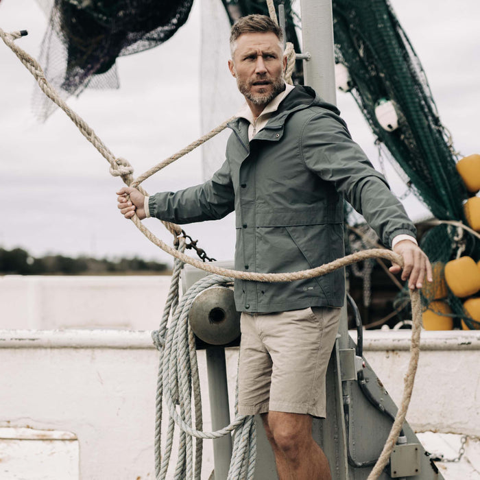 fit model posing in The Chapman Jacket in Sea Green Sixty Forty