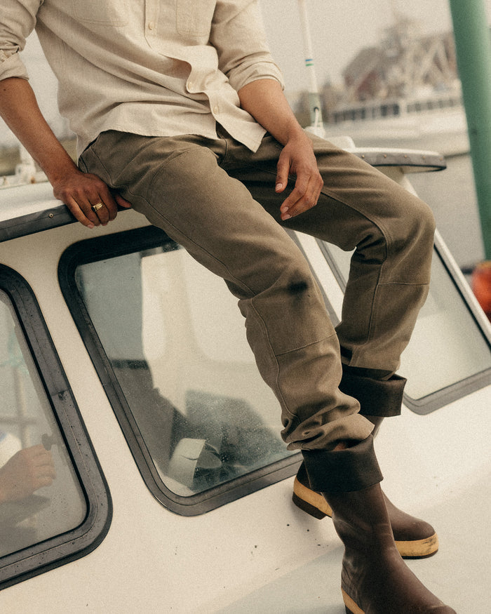 fit model walking wearing The Chore Pant in Stone Chipped Canvas