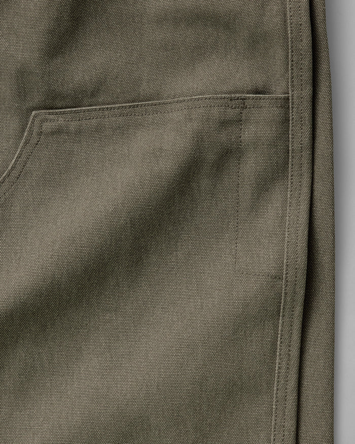 material shot of the double knee detail of The Chore Pant in Stone Chipped Canvas