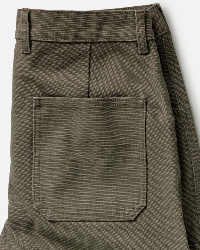 material shot of the back pocket on The Chore Pant in Stone Chipped Canvas