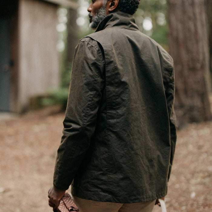 fit model showing the back of The Clutch Jacket in Soil Waxed Canvas