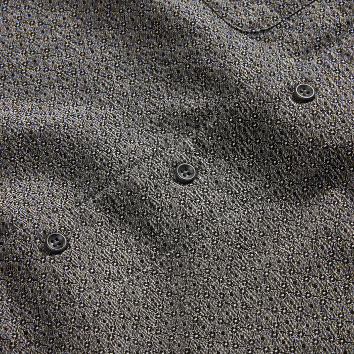 material shot of the charcoal buttons on The Conrad in Black Indigo Jacquard Floral