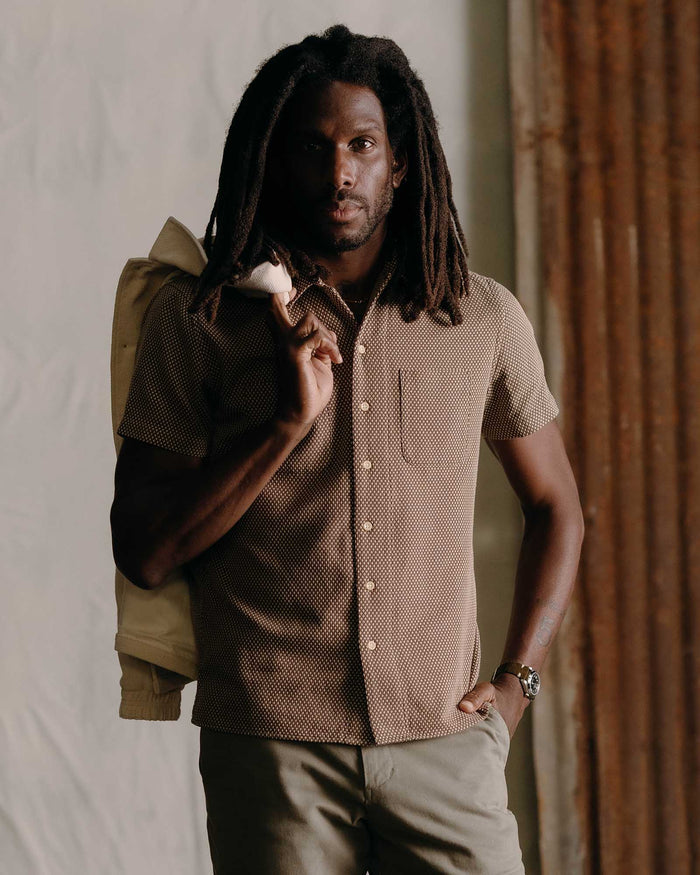 fit model posing in The Conrad Shirt in Cocoa Dobby