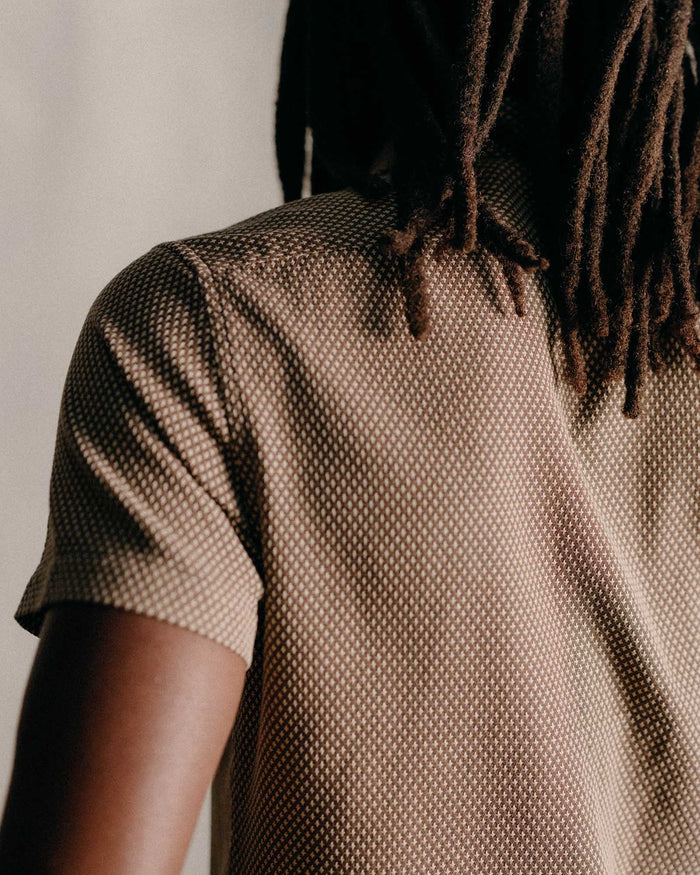 fit model showing the back of The Conrad Shirt in Cocoa Dobby