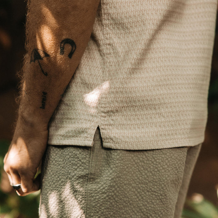 fit model showing the side of The Conrad in Sand Jacquard