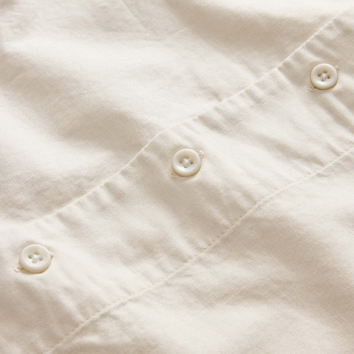 material shot of the buttons on The Conrad Shirt in Seaside Embroidery