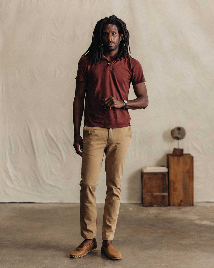 fit model posing in The Cotton Hemp Polo in Black Cherry