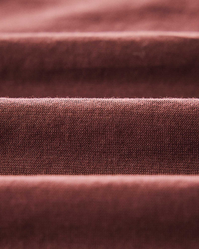 material shot of the fabric on The Cotton Hemp Polo in Black Cherry