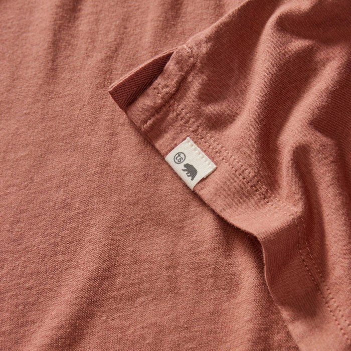 material shot of the logo on The Cotton Hemp Polo in Fired Clay