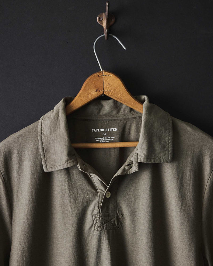 editorial image of The Cotton Hemp Polo in Olive hanging