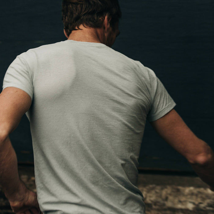 fit model wearing The Cotton Hemp Tee in Bay Mist, back shot