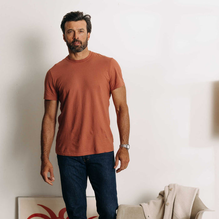 fit model posing in The Cotton Hemp Tee in Fired Clay