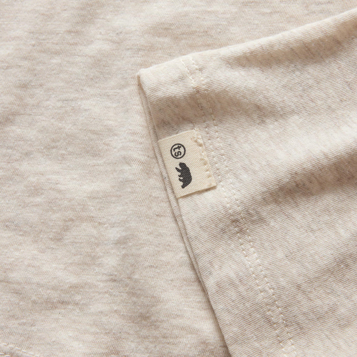 material shot of the hem on The Cotton Hemp Tee in Heathered Oat