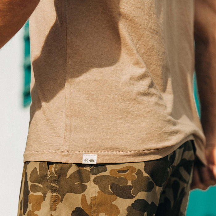 fit model showing material shot of the hem on The Cotton Hemp Tee in Khaki