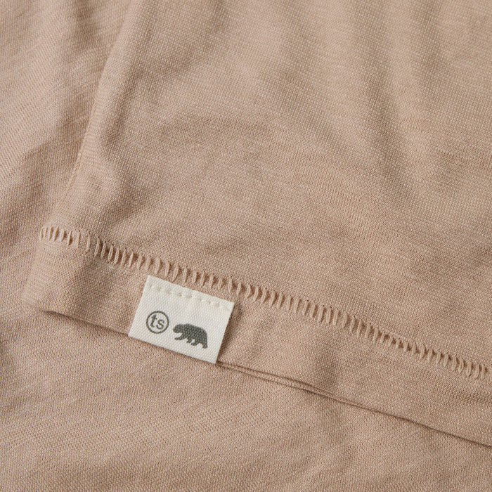 material shot of the hem logo of The Cotton Hemp Tee in Khaki