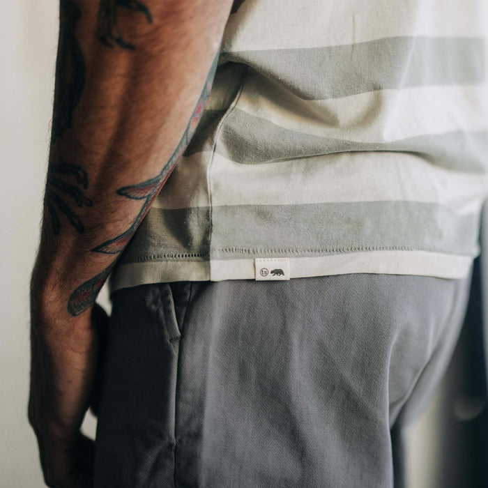 fit model showing the TS label on The Cotton Hemp Tee in Natural and Sagebrush Stripe