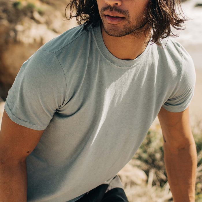 fit model sitting in The Cotton Hemp Tee in Ocean