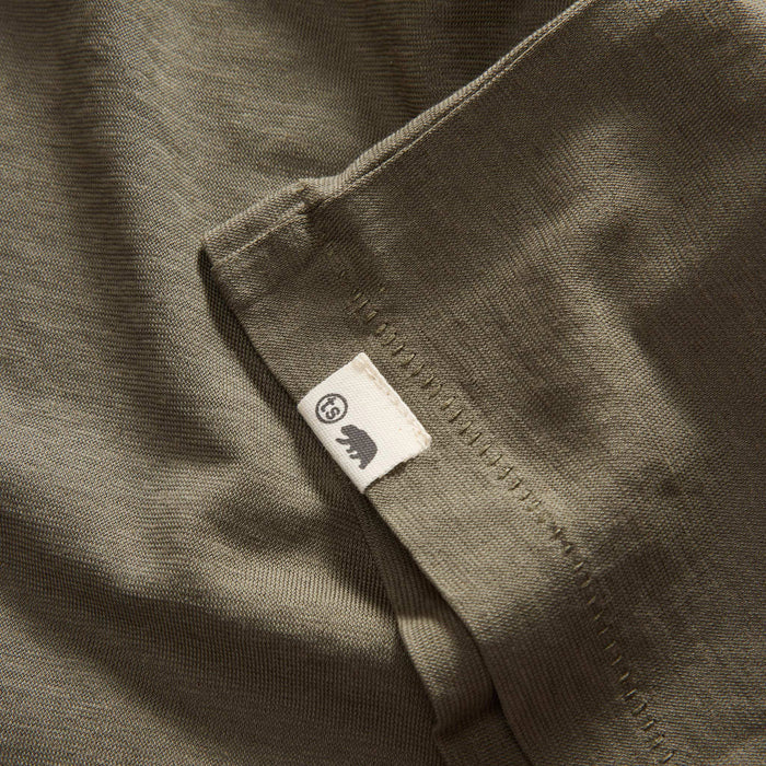 material shot of the hem with the TS label on The Cotton Hemp Tee in Olive
