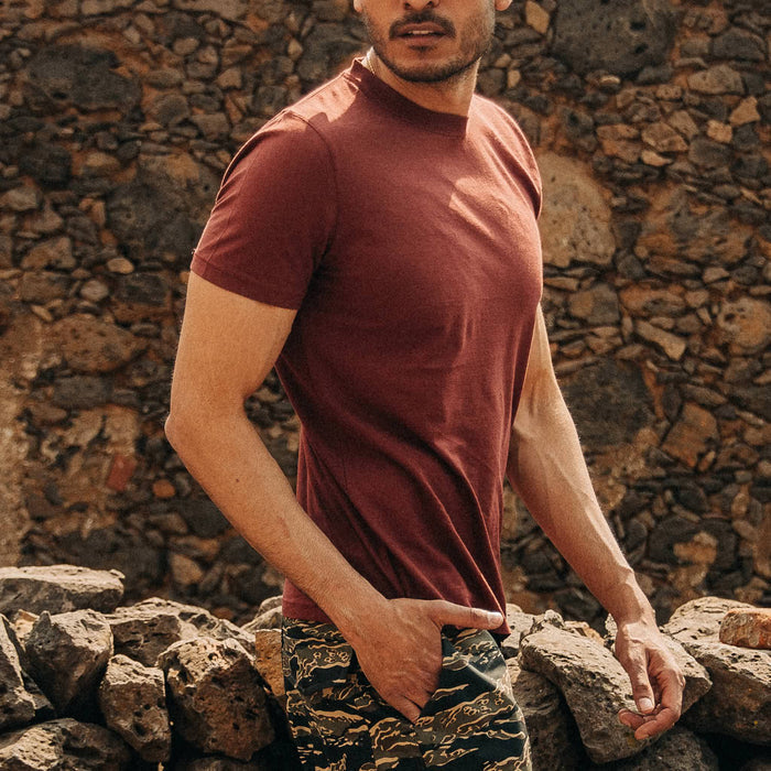 fit model wearing The Cotton Hemp Tee in Rust, hand in pocket, walking right
